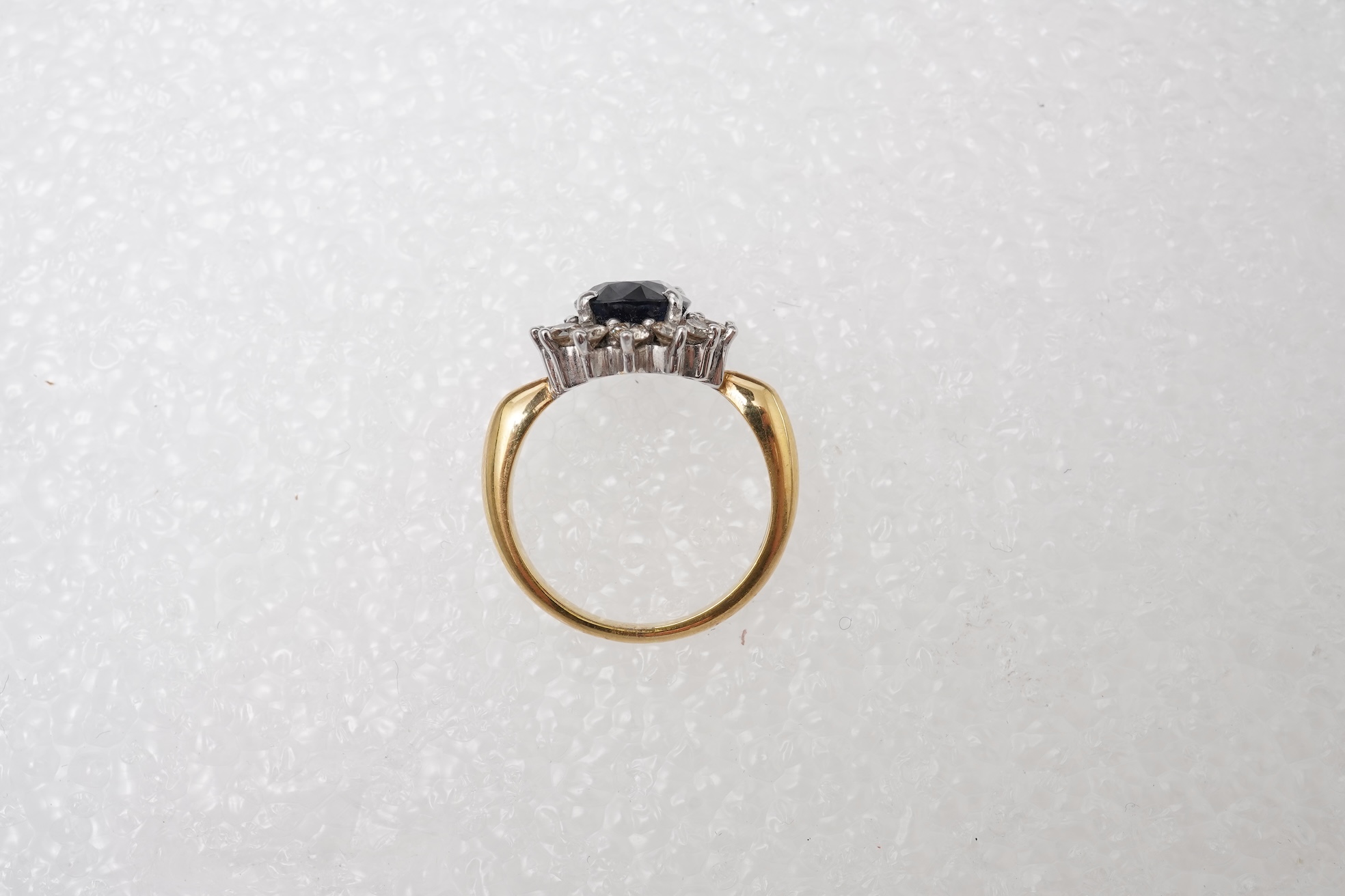 A sapphire and diamond cluster ring